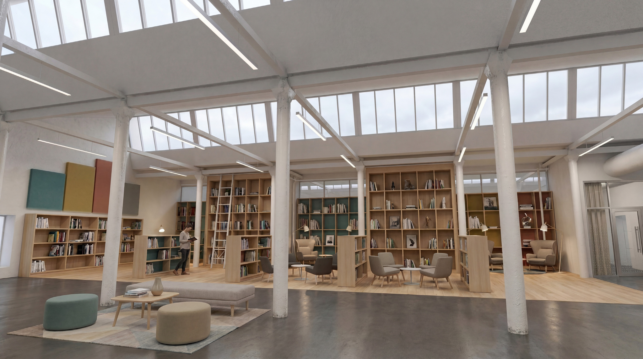 Biblioteket i sagtakshallen med nisjer og høye bokhyller